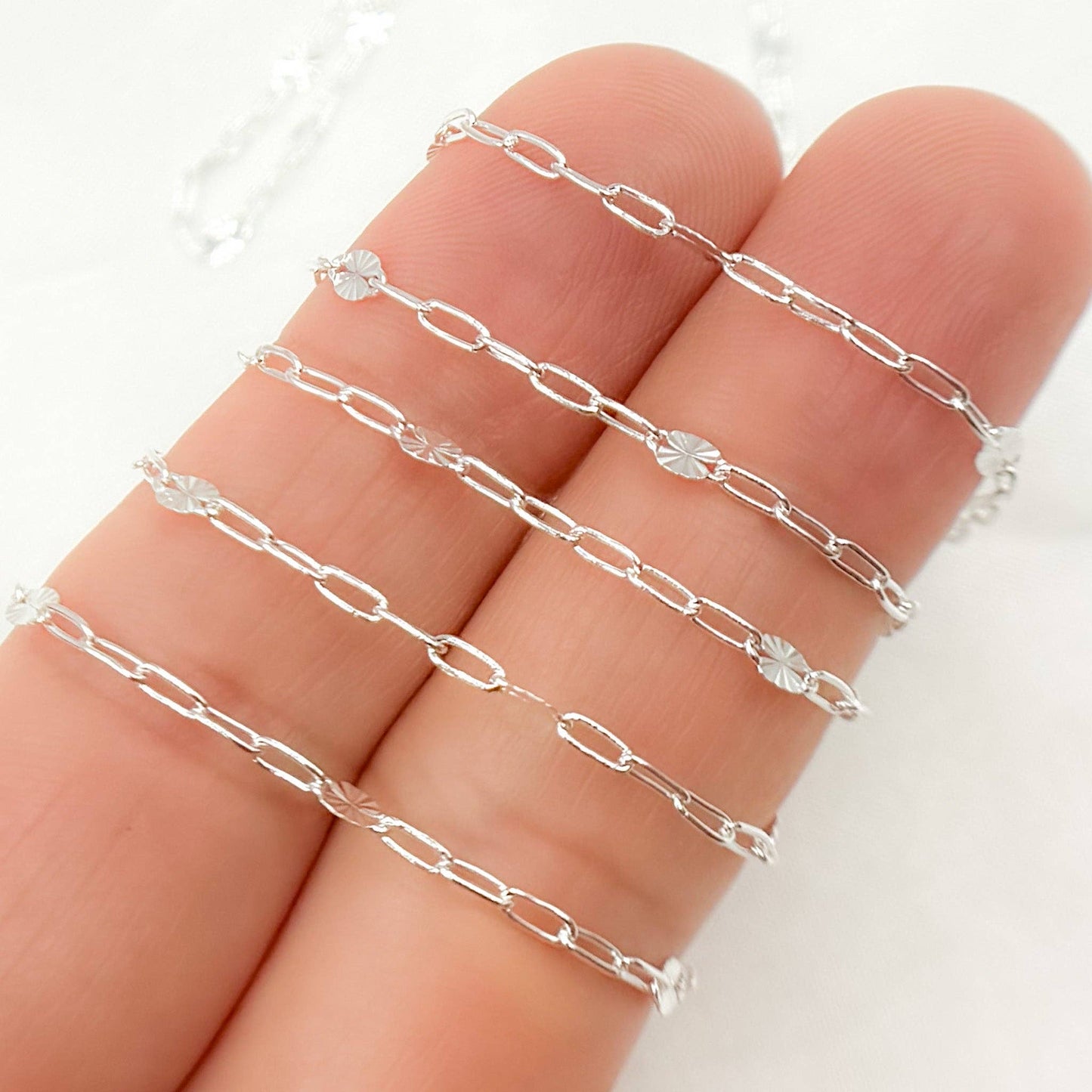 V241SS. Sterling Silver Smooth Paperclip and Diamond Cut Marina Link Chain