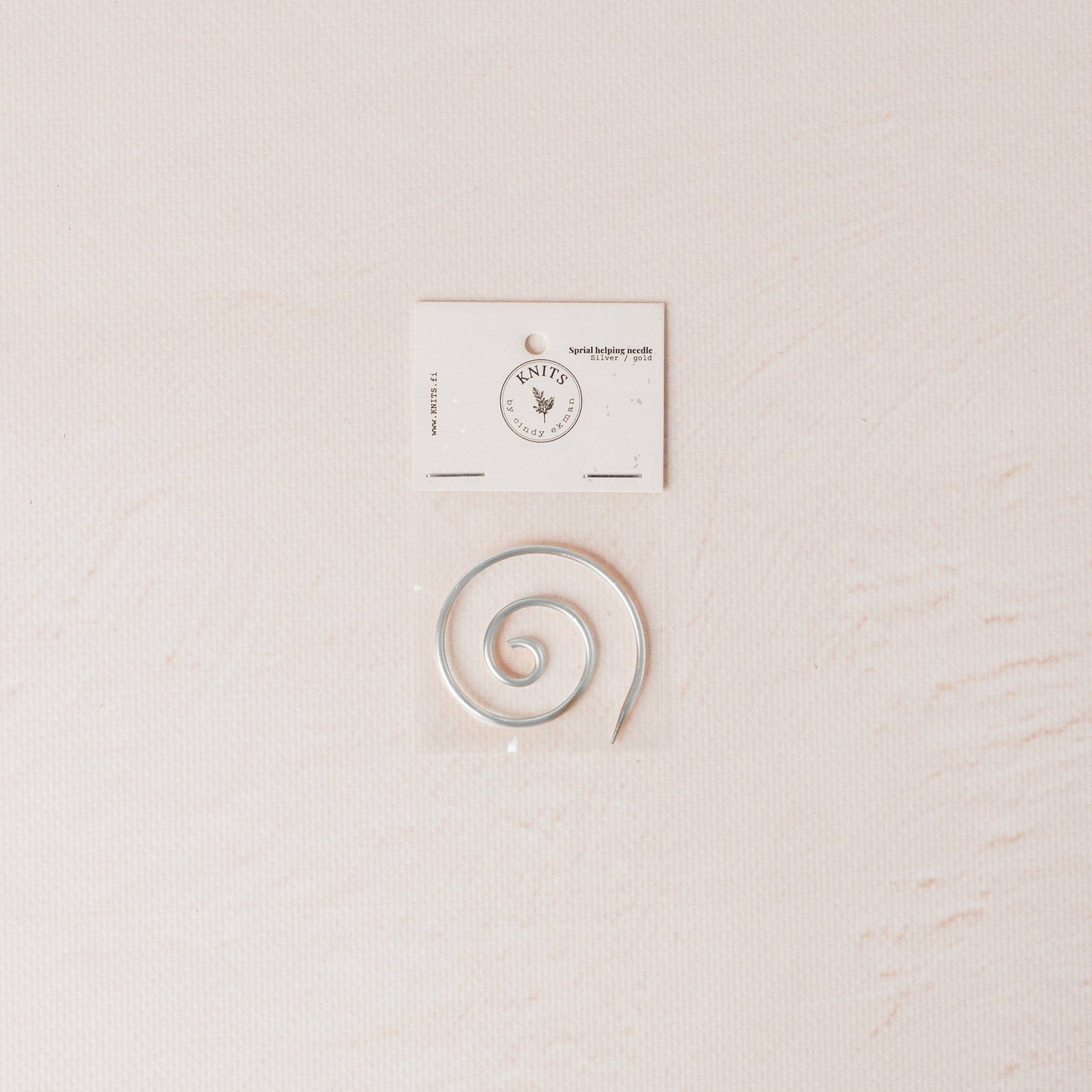 Spiral helping needle