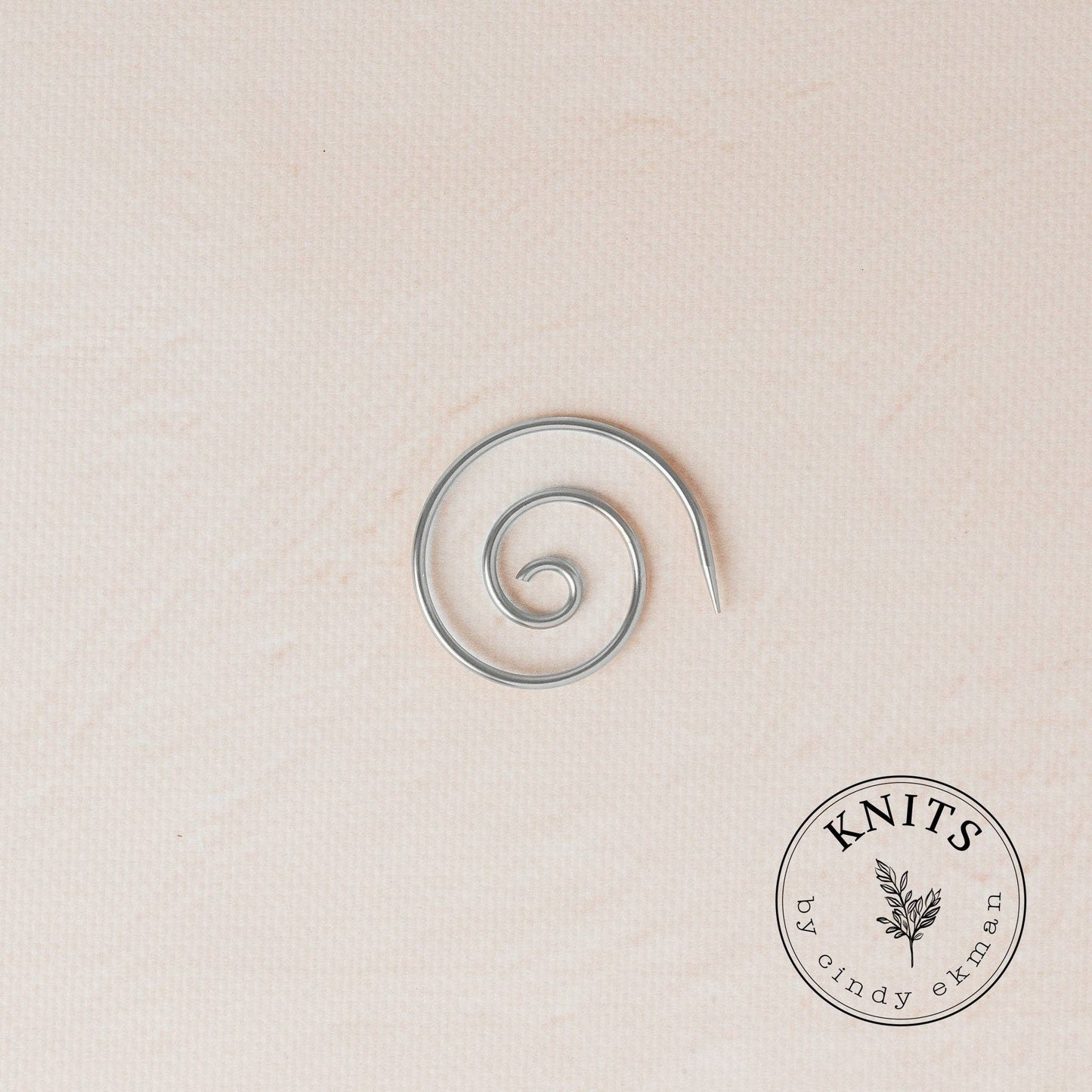 Spiral helping needle