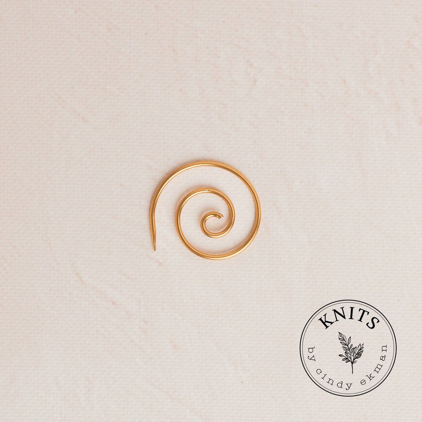 Spiral helping needle